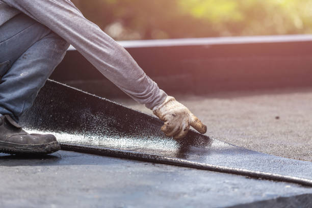 Professional Basement Waterproofing technician working in Haymarket, VA